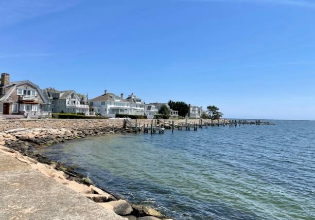 Aerial view of luxury shoreline homes with private beach access in Madison and Guilford, CT.
