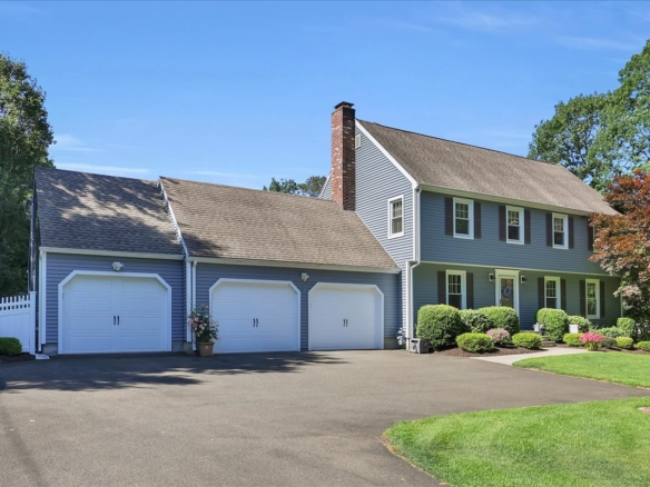 Red ranch-style home at 60 Chestnut Lane in Hamden, CT, featuring a newer roof and accessibility ramp near Mt. Carmel.