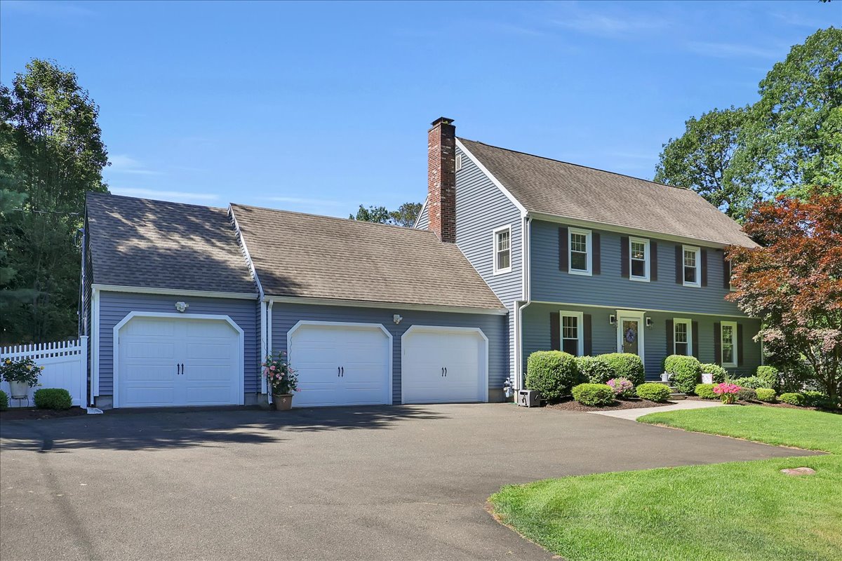 Red ranch-style home at 60 Chestnut Lane in Hamden, CT, featuring a newer roof and accessibility ramp near Mt. Carmel.