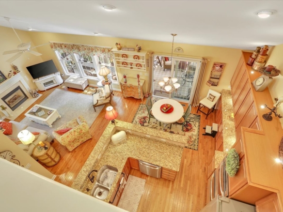 Aerial view of the open-concept kitchen, breakfast nook, and living room at 33 Wadsworth Ln.