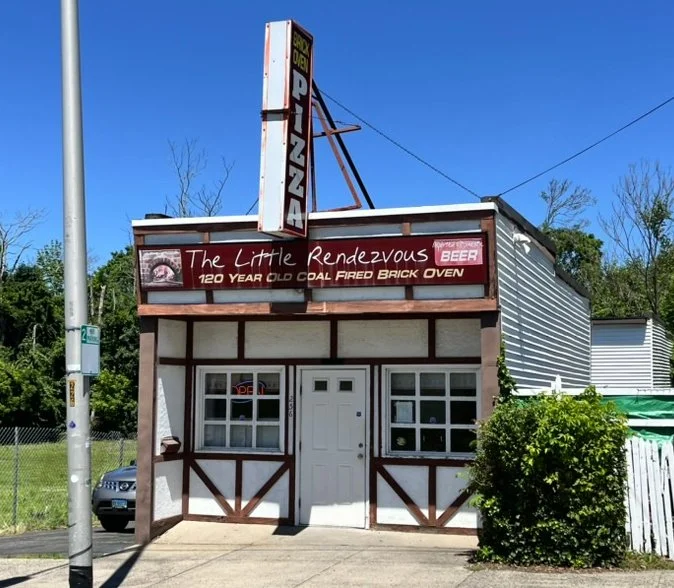 The Little Rendezvous pizza restaurant in Meriden, CT featuring its historic coal-fired brick oven and iconic local dining experience near homes for sale in Meriden, CT.