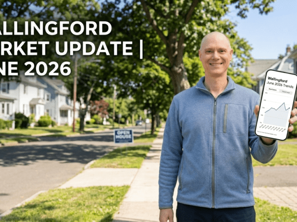 John Smolenski, Wallingford Realtor, presenting a June 2026 real estate market update from a smartphone on a neighborhood street in Wallingford, CT. Image includes a 'Wallingford June 2026 Trends' chart and an 'Open House' sign.