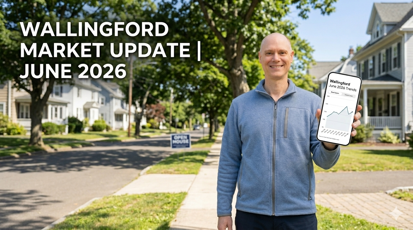 John Smolenski, Wallingford Realtor, presenting a June 2026 real estate market update from a smartphone on a neighborhood street in Wallingford, CT. Image includes a 'Wallingford June 2026 Trends' chart and an 'Open House' sign.